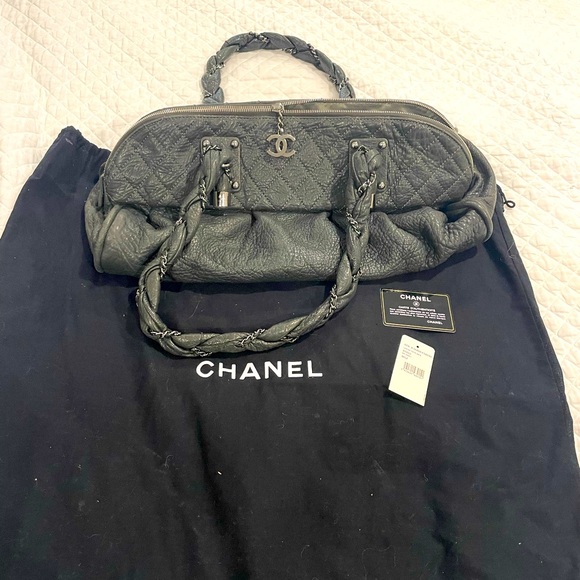 Chanel woman’s handbag gray